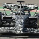 Alfa Romeo reserve driver Robert Kubica steers the car during a Formula One pre-season testing session at the Catalunya racetrack in Montmelo, just outside of Barcelona, Spain, Wednesday, Feb. 23, 2022. (AP Photo/Joan Monfort)