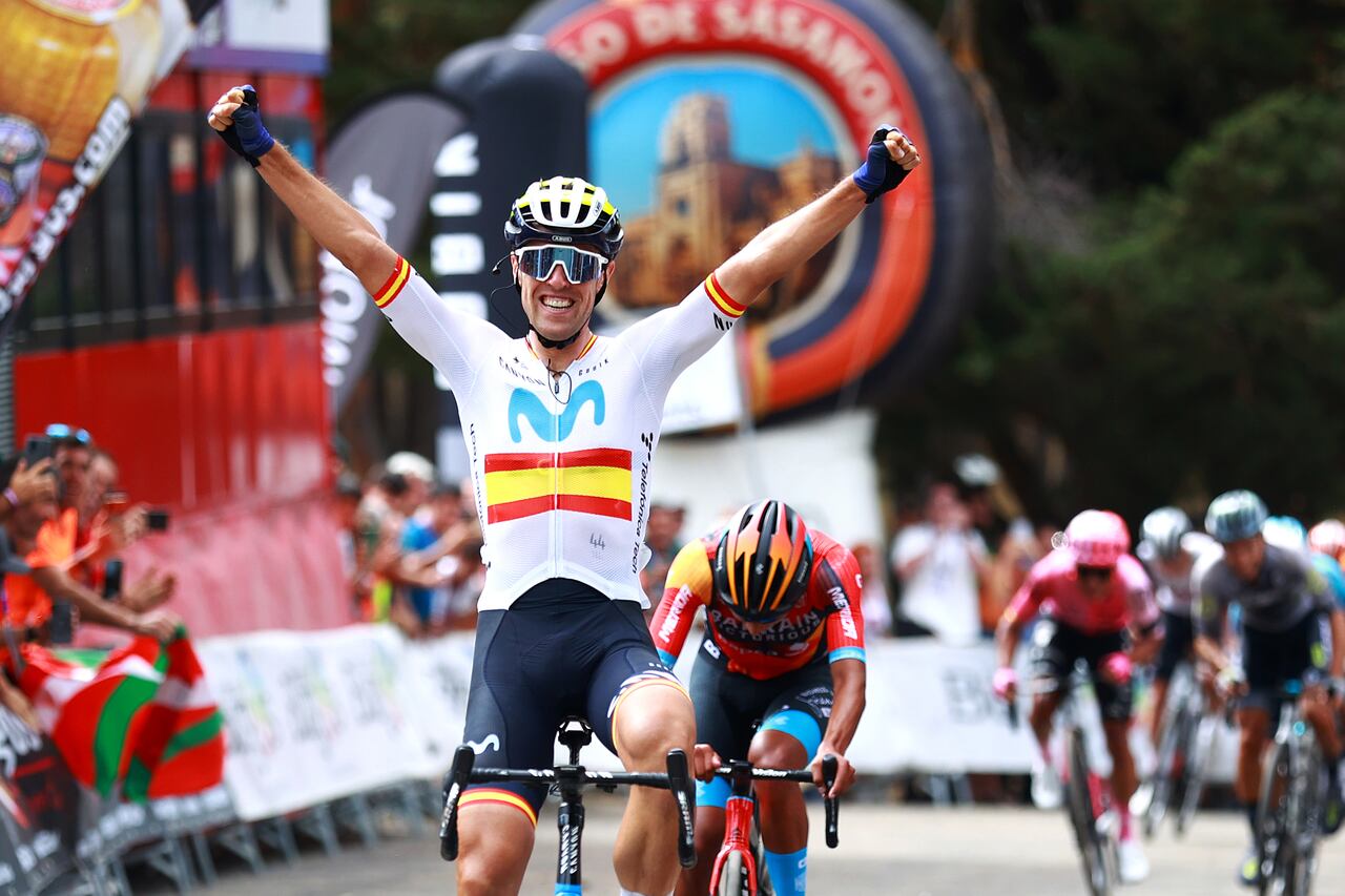 ACEBEL-VIZCARRA, SPAIN - AUGUST 18: (EDITOR'S NOTE: Alternate crop) Oier Lazkano Lopez of Spain and Movistar Team celebrates at finish line as stage winner ahead of Santiago Buitrago Sanchez of Colombia and Team Bahrain Victorious during the 45th Vuelta a Burgos 2023, Stage 4 a 157km stage from Santa Gadea del Cid to Pradoluengo (Acebel-Vizcarra) 1058m on August 18, 2023 in Acebel-Vizcarra, Spain. (Photo by Gonzalo Arroyo Moreno/Getty Images)