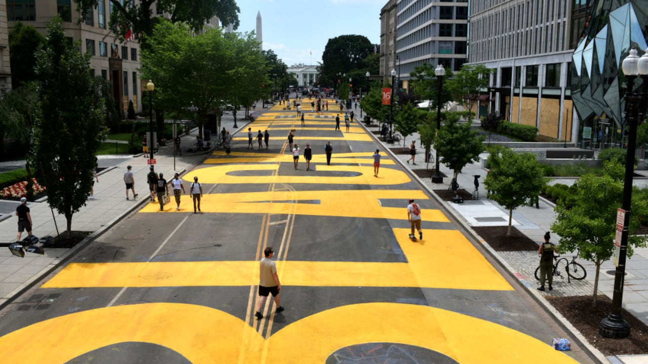 Local artists and city staff are painting Black Lives Matter in massive yellow letters on 16th Street in close proximity to the White House. Artists arrived to begin painting around 4 a.m. in Washington, DC on June 05, 2020.