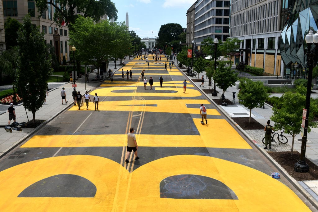 Local artists and city staff are painting Black Lives Matter in massive yellow letters on 16th Street in close proximity to the White House. Artists arrived to begin painting around 4 a.m. in Washington, DC on June 05, 2020.