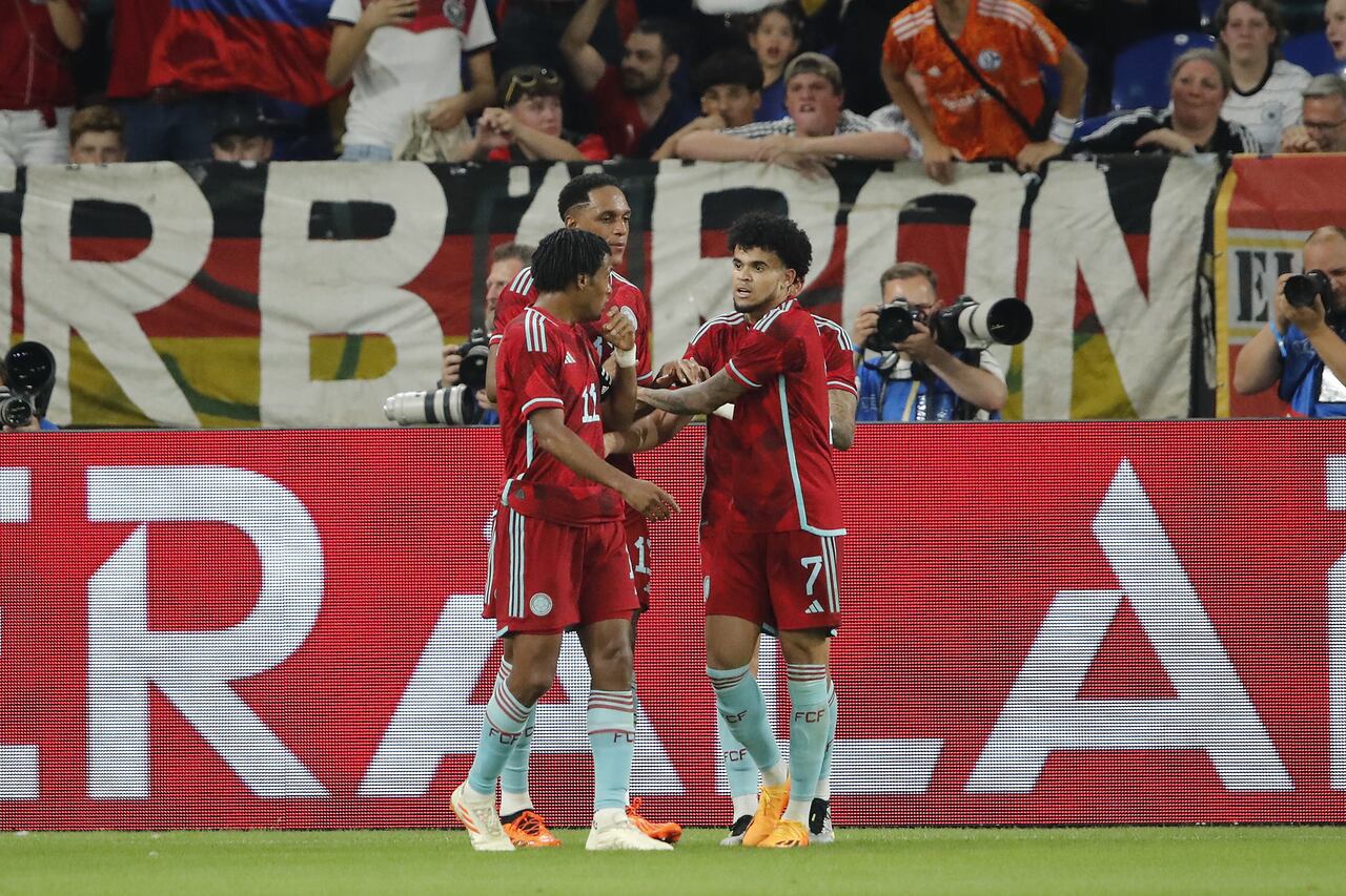 GELSENKIRCHEN - (LR) Juan Cuadrado of Colombia,Yerry Mina of Colombia, Luis Diaz of Colombia celebrate the 0-1 during the friendly Interland match between Germany and Colombia at the Veltins-Arena on June 20, 2023 in Gelsenkirchen, Germany. AP | Dutch Height | BART STOUTJESDYK (Photo by ANP via Getty Images)