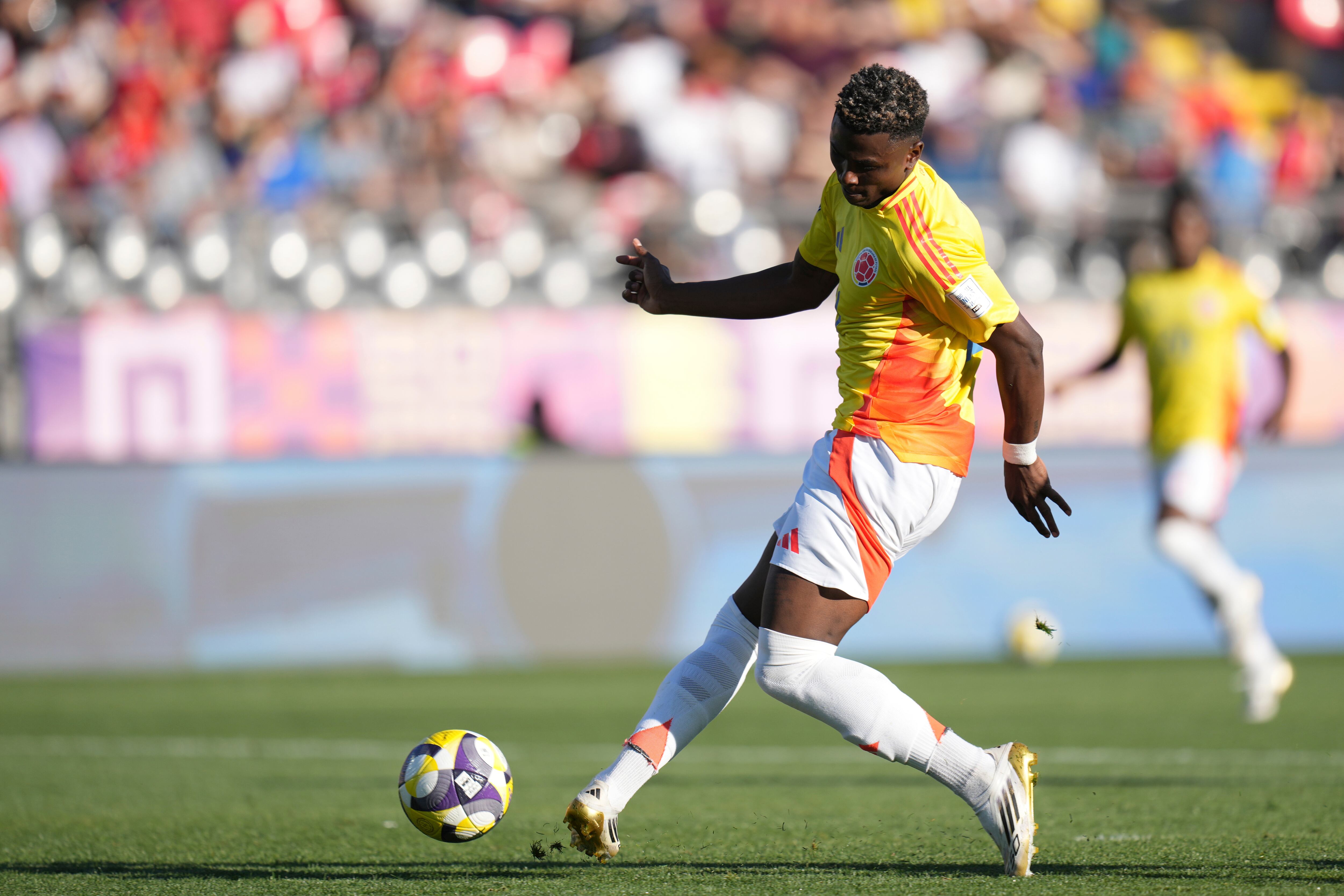 Colombia's Neyser Villareal scores his side's second goal against Spain during a FIFA U-20 World Cup quater-final soccer match at Fiscal Stadium in Talca, Chile, Saturday, Oct. 11, 2025. (AP Photo/Andre Penner)