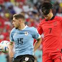 Soccer Football - FIFA World Cup Qatar 2022 - Group H - Uruguay v South Korea - Education City Stadium, Al Rayyan, Qatar - November 24, 2022 Uruguay's Federico Valverde in action with South Korea's Son Heung-min REUTERS/Kim Hong-Ji