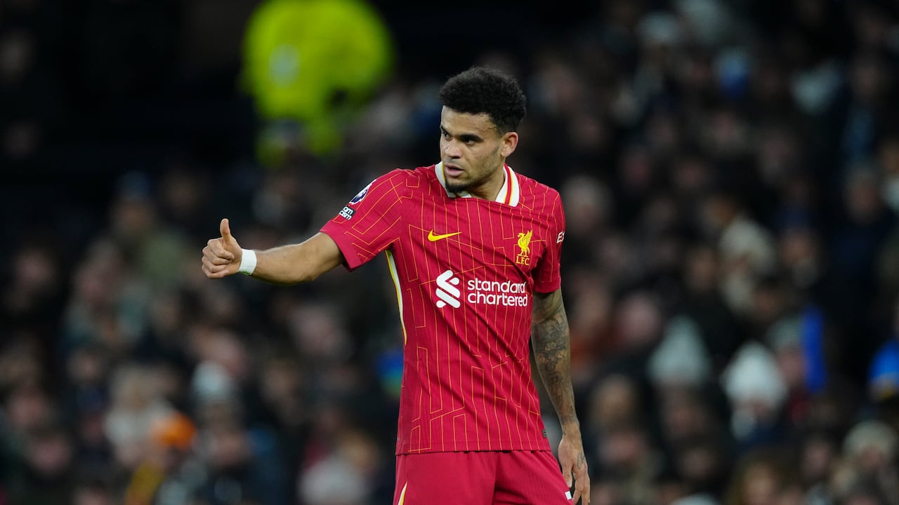 Liverpool's Luis Diaz gestures during the English Premier League soccer match between Tottenham and Liverpool at Tottenham Hotspur Stadium in London, Sunday, Dec. 22, 2024. (AP Photo/Dave Shopland)