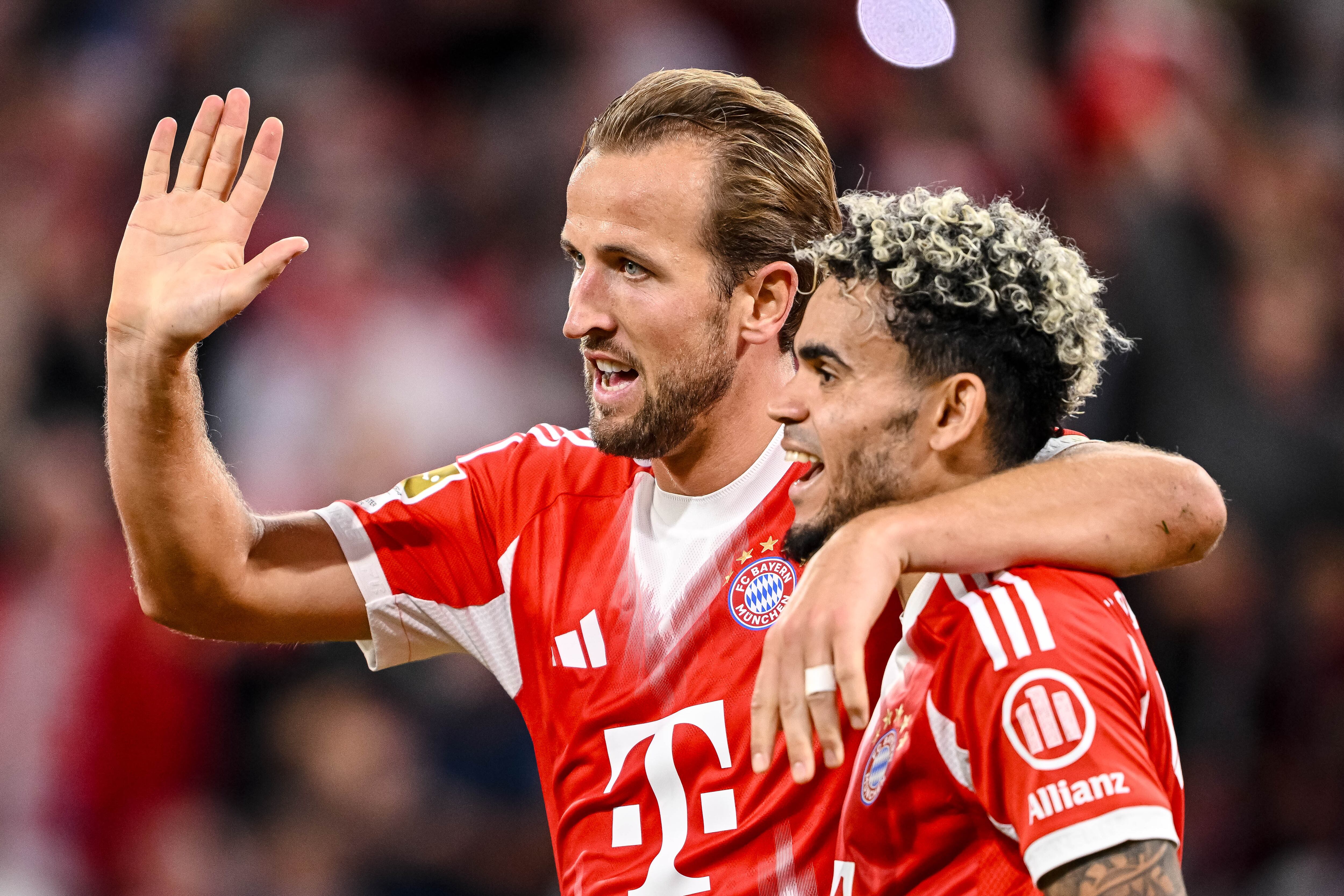 Munich, Germany - August 22: Harry Kane of Bayern Muenchen and Luis Díaz of Bayern Muenchen celebrates after scoring his team's fifth goal with teammates during the Bundesliga match between FC Bayern München and RB Leipzig at Allianz Arena on August 22, 2025 in Munich, Germany. (Photo by Harry Langer/DeFodi Images/DeFodi via Getty Images)