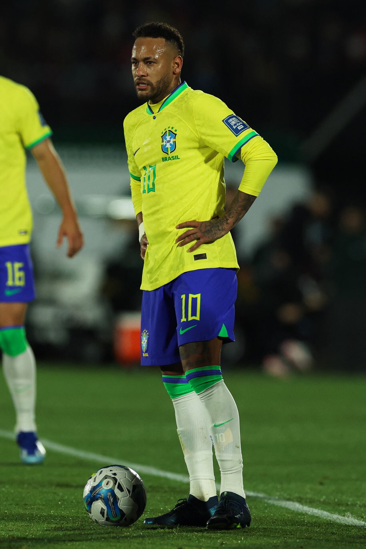 Brazil's forward Neymar stands in front of the ball during the 2026 FIFA World Cup South American qualification football match between Uruguay and Brazil at the Centenario Stadium in Montevideo on October 17, 2023. (Photo by Pablo PORCIUNCULA / AFP)