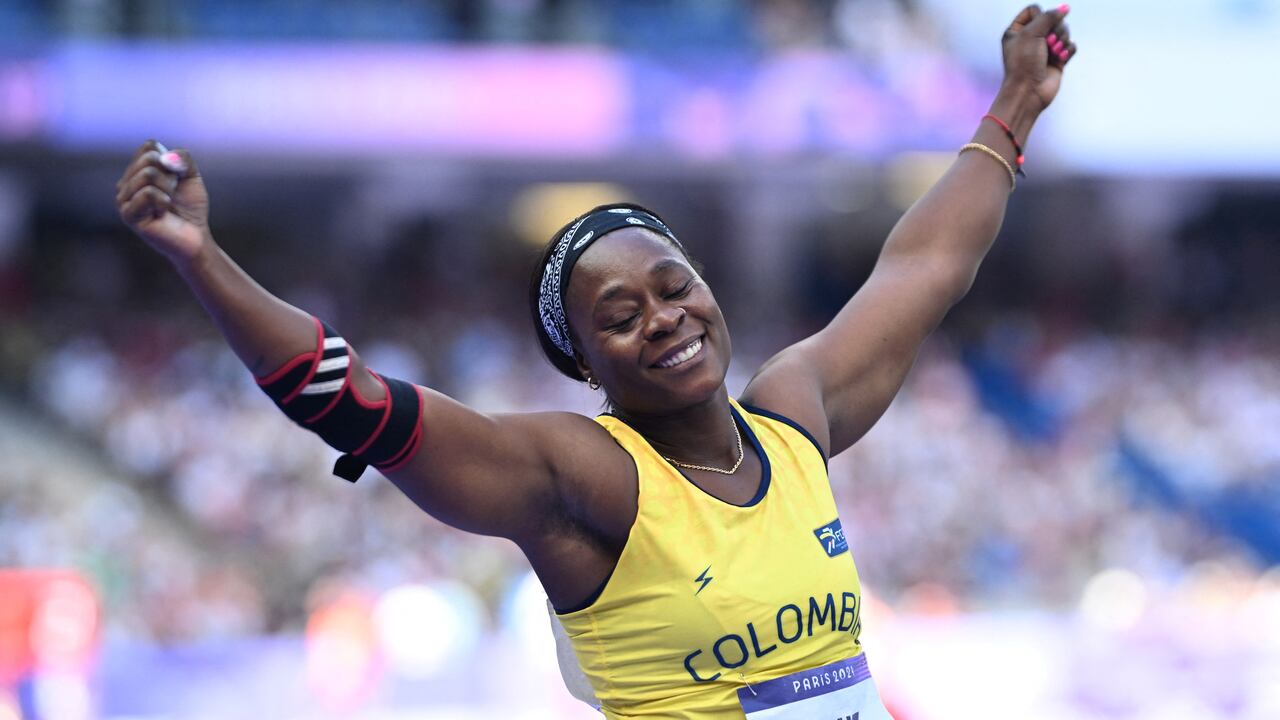 Colombia's Flor Denis Ruiz Hurtado reacts as she competes in the women's javelin throw qualification of the athletics event at the Paris 2024 Olympic Games at Stade de France in Saint-Denis, north of Paris, on August 7, 2024. (Photo by Kirill KUDRYAVTSEV / AFP)