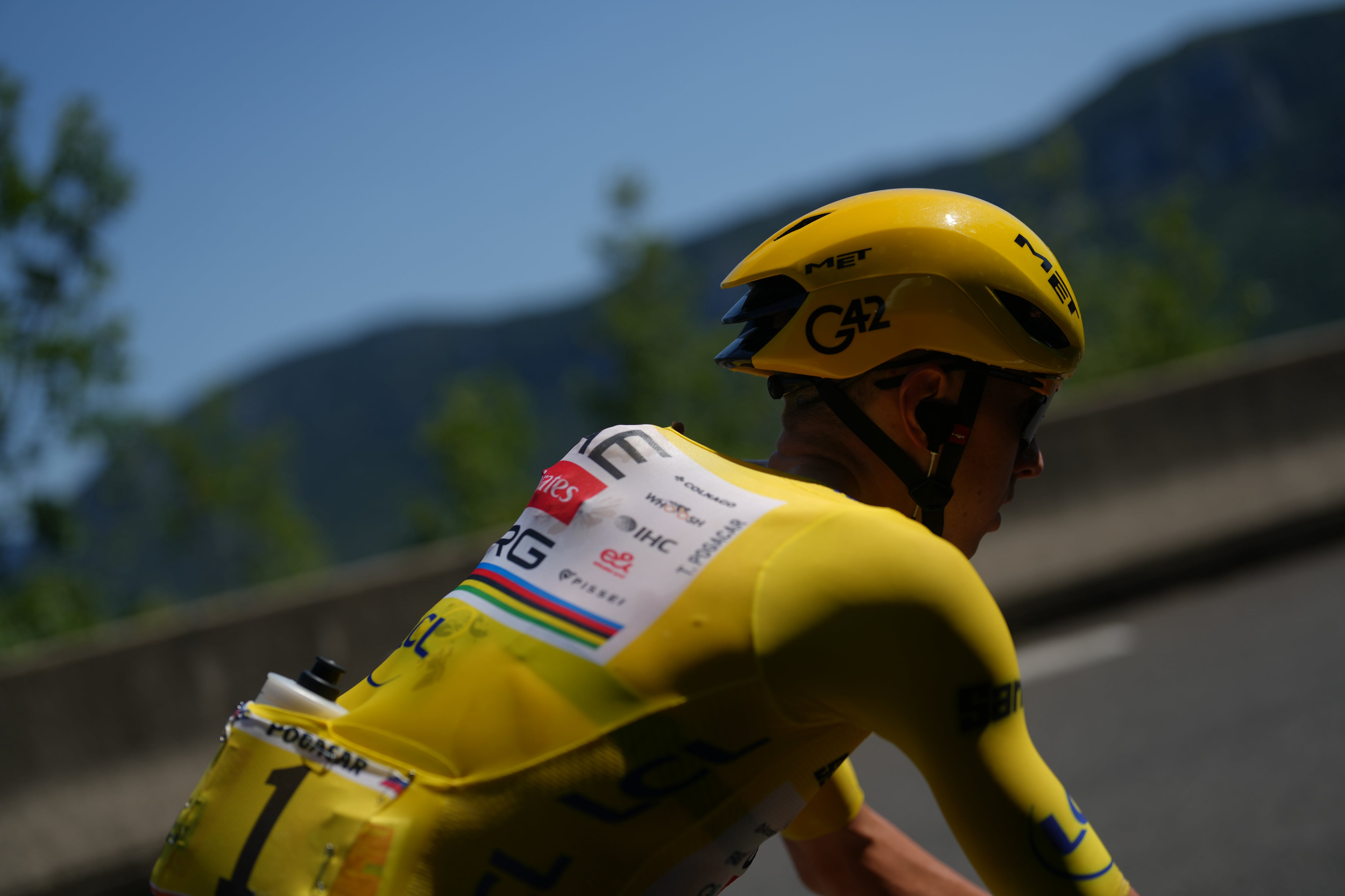 Slovenia's Tadej Pogacar, wearing the overall leader's yellow jersey, rides in the pack, during the fourth stage of the Tour de France cycling race over 181.9 kilometers (112.4 miles) with start in Carcassonne and finish in Foix, France, Tuesday, July 7, 2026. (AP Photo/Thibault Camus)