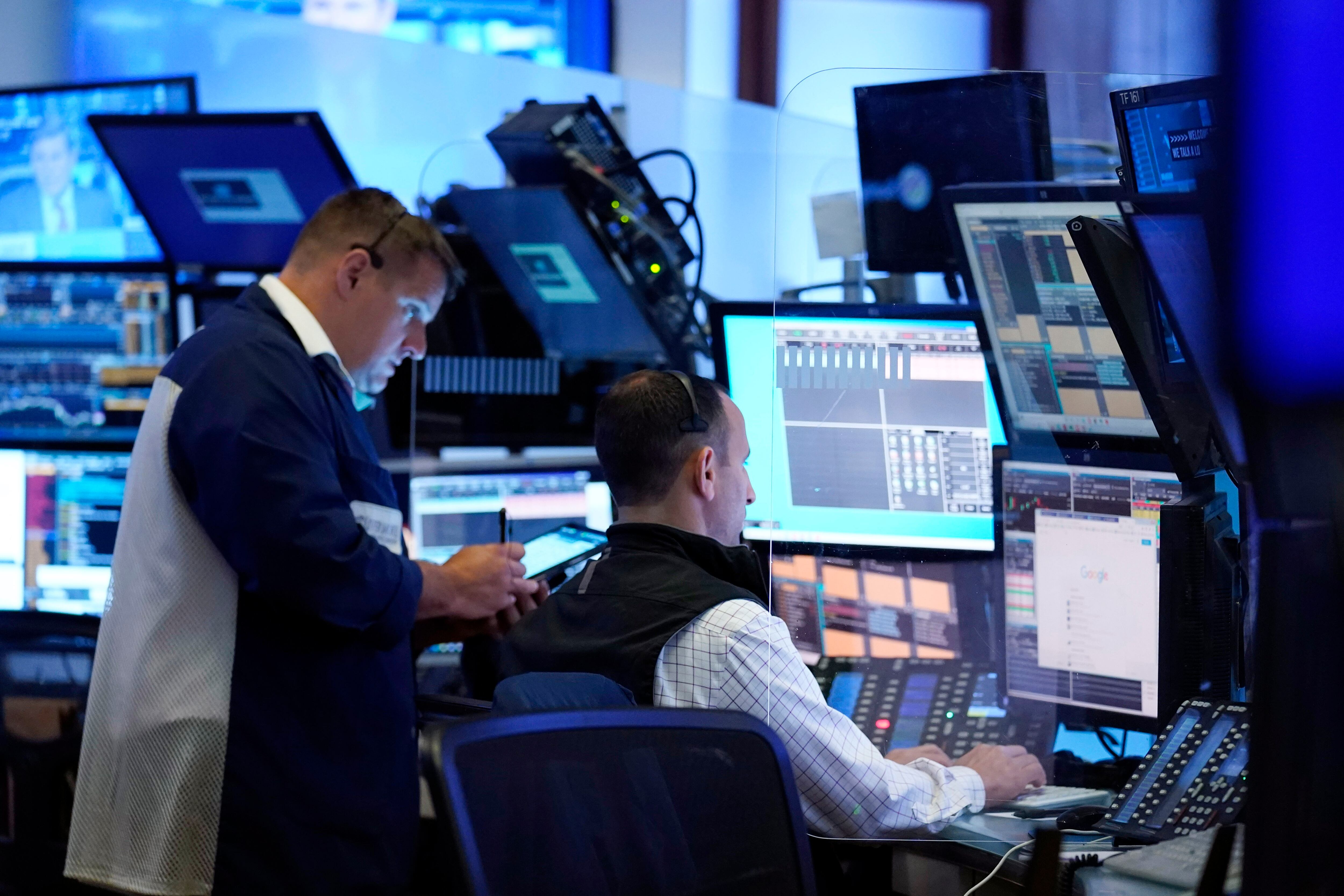 Wall Street, AP (AP Photo/Richard Drew)