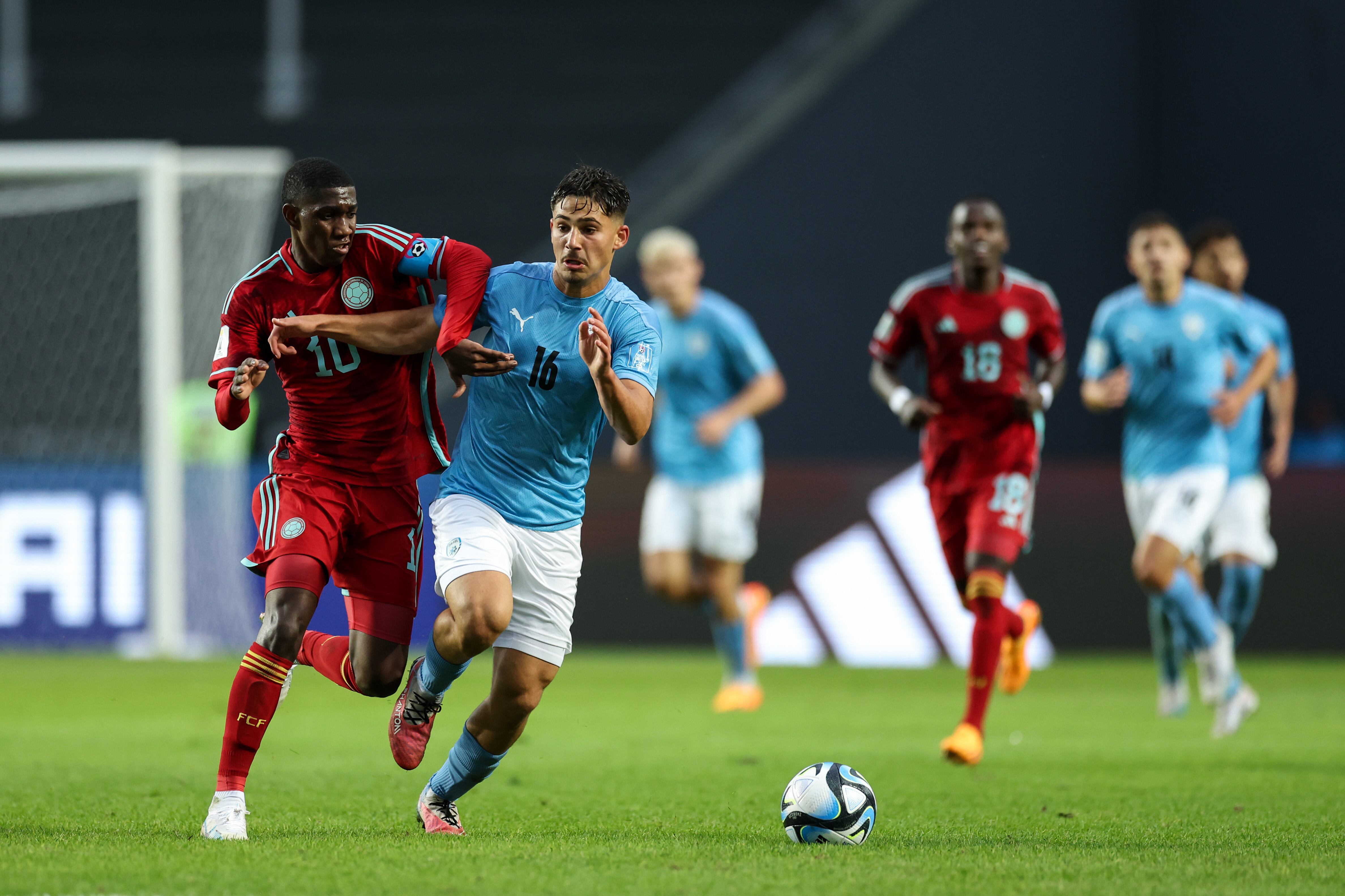 LA PLATA, ARGENTINA - MAY 21: Yaser Asprilla of Colombia fights for the ball with Ran Binyamin of Israel during the FIFA U-20 World Cup Argentina 2023  Group C match between Israel and Colombia at Estadio La Plata on May 21, 2023 in La Plata, Argentina. (Photo by Tim Nwachukwu - FIFA/FIFA via Getty Images)