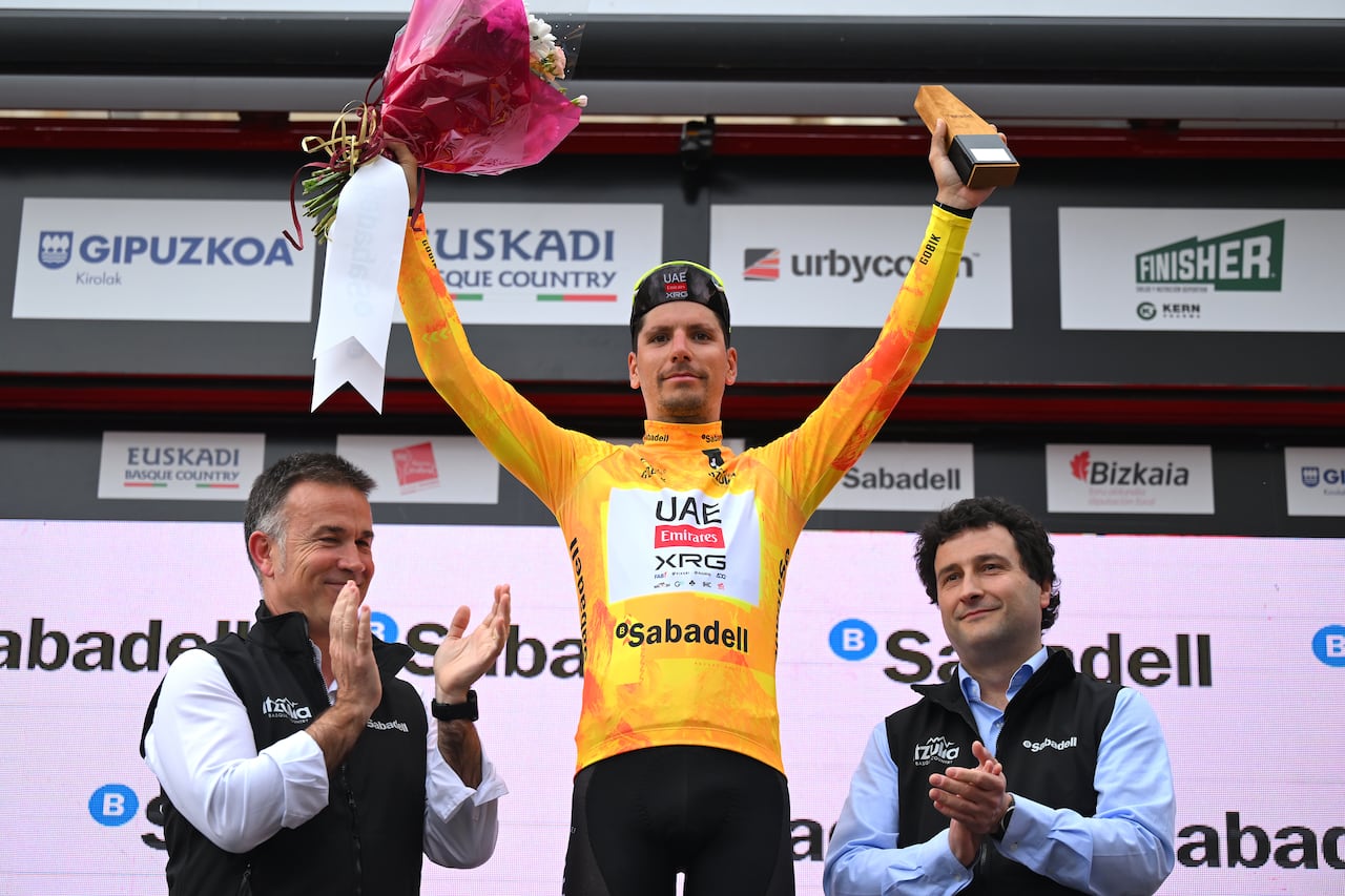 URDUNA, SPAIN - APRIL 11: Joao Almeida of Portugal and UAE Team Emirates - XRG - Yellow Leader Jersey celebrates at podium during the 64th Itzulia Basque Country 2025, Stage 5 a 172.3km stage from Urduna to Urduna / #UCIWT / on April 11, 2025 in Urduna, Spain. (Photo by Tim de Waele/Getty Images)