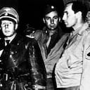 File picture dated 1945, showing Nazi SS - Standartenfuhrer Walter Rauff , center, shortly after being arrested at the Regina Hotel in Milano, Italy, January 21, 1984. Rauff, who is the object of a warrant for arrest issued in March 1961 by the Hanover Attorney general for the murder of more than 97,000 Jews by mobile gas vans, lives in Chile ever since the fifties. Nazi criminal hunter Serge Klarsfeld' s wife, Beate Klarsfeld, arrived Thursday in Santiago, Chile, to try to obtain Rauff's expulsion and for this to condut a public and media campaign in Chile. (AP Photo)