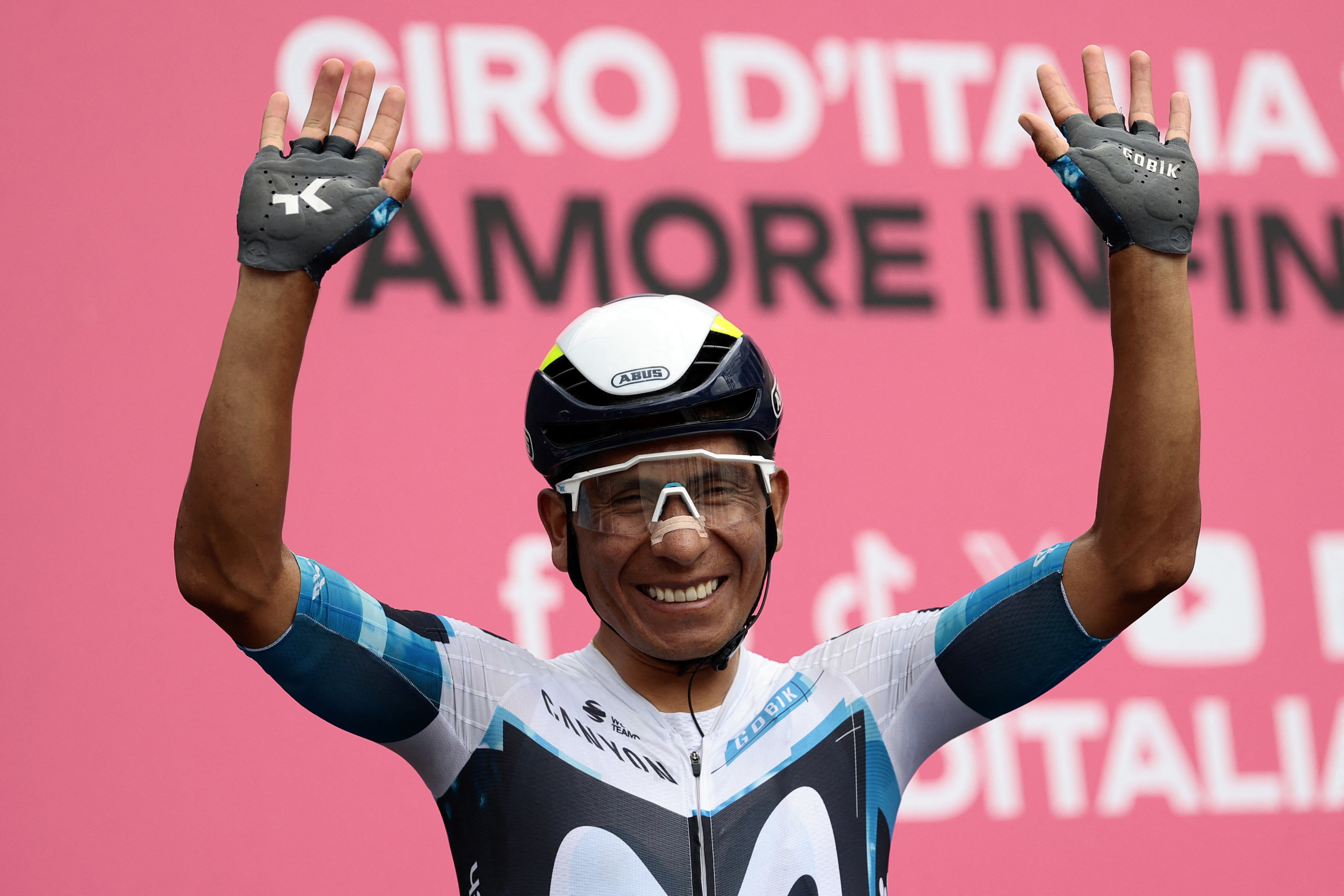 Movistar Team's Colombian rider Nairo Quintana waves during the ceremony held ahead of the start of the 9th stage of the 108th Giro d'Italia cycling race of 181kms from Gubbio to Siena on May 18, 2025. (Photo by Luca Bettini / AFP)