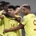Colombia's Luis Diaz (14) celebrates scoring his side's third goal against Peru during a qualifying soccer match for the FIFA World Cup Qatar 2022 at the National stadium in Lima, Peru, Thursday, June 3, 2021. (Paolo Aguilar/Pool via AP)