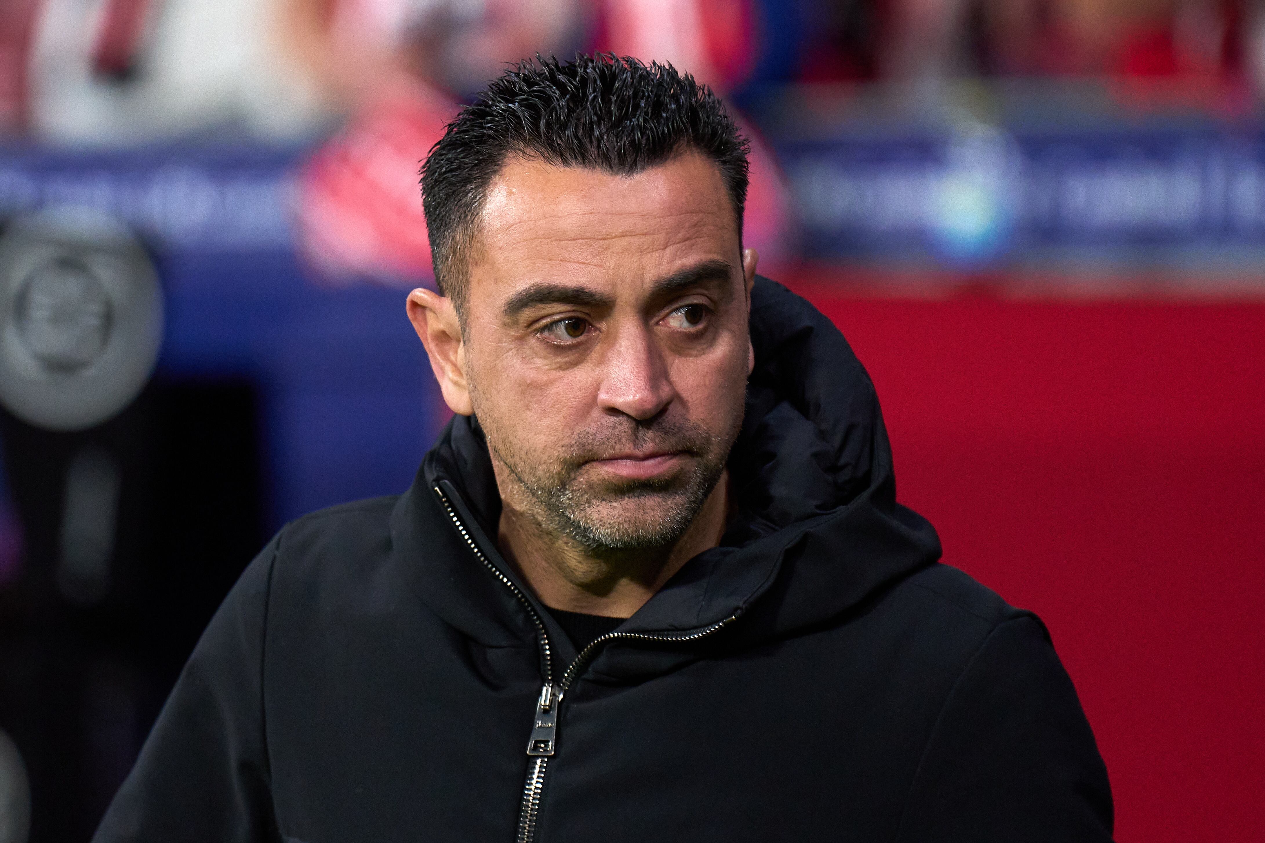 MADRID, SPAIN - MARCH 17: Head coach Xavi Hernandez of FC Barcelona looks on prior to the LaLiga EA Sports match between Atletico Madrid and FC Barcelona at Civitas Metropolitano Stadium on March 17, 2024 in Madrid, Spain. (Photo by Angel Martinez/Getty Images)