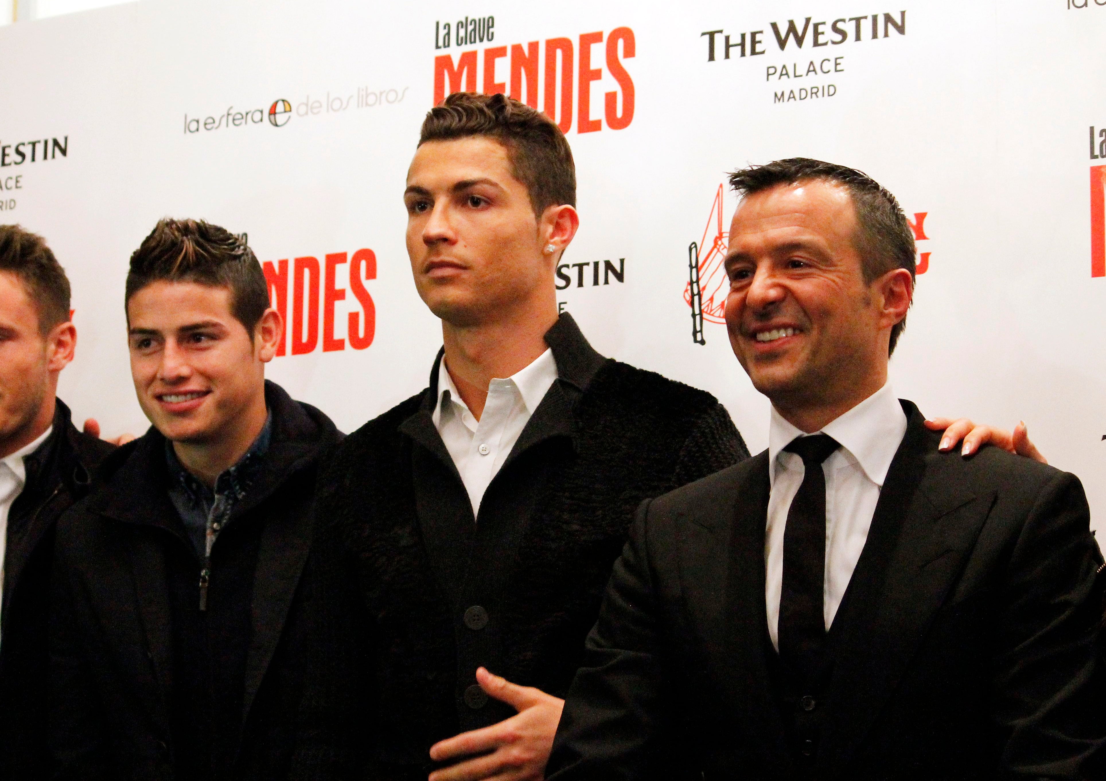 MADRID, SPAIN - JANUARY 22: Cristiano Ronaldo (C) and James Rodriguez (L) attend the presentation of the book 'The Key to Mendes' ('La Clave Mendes') by sport agent Jorge Mendes (R) at Palace Hotel on January 22, 2015 in Madrid, Spain. (Photo by Getty Images/Europa Press/Europa Press)