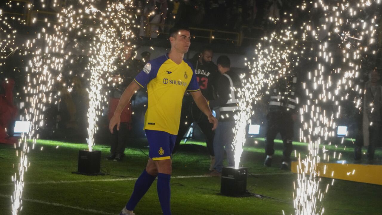 Cristiano Ronaldo walks during his official unveiling as a new member of Al Nassr soccer club in in Riyadh, Saudi Arabia, Tuesday, Jan. 3, 2023. Ronaldo, who has won five Ballon d'Ors awards for the best soccer player in the world and five Champions League titles, will play outside of Europe for the first time in his storied career. (AP/Amr Nabil)