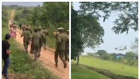 Militares y población civil socorren a heridos tras la caída de un avión de la FAC en Puerto Leguízamo, Putumayo.