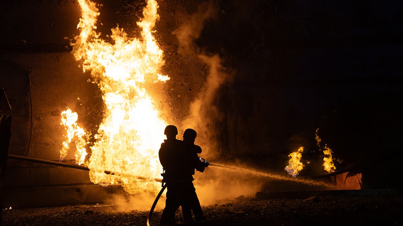 KHARKIV, UKRAINE - JUNE 5: Firefighters extinguish a fire on pipe at residential district after a Russian night drone attack on June 5, 2025 in Kharkiv, Ukraine. 18 People, including four children, suffered acute stress reactions due to the Russian attack on the Slobidskyi District of Kharkiv, the Kharkiv region police reported. (Photo by Oleksandr Magula/Suspilne Ukraine/JSC "UA:PBC"/Global Images Ukraine via Getty Images)