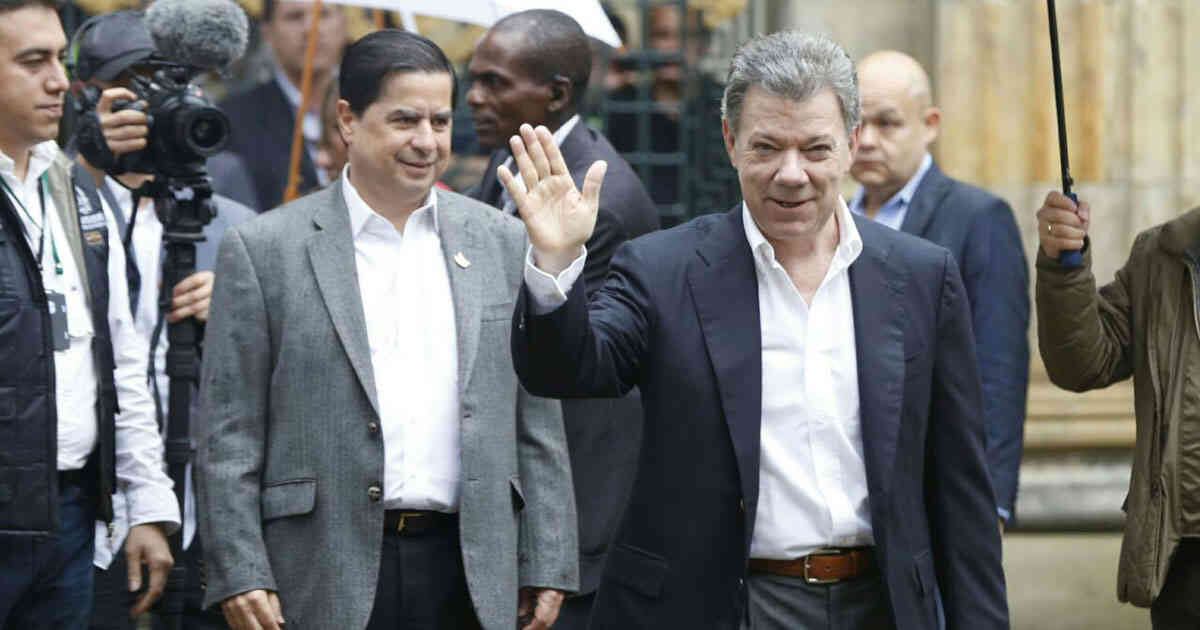 Juan Fernando Cristo y Juan Manuel Santos.