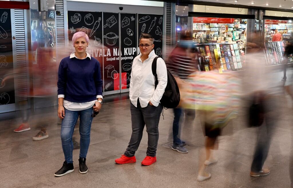 Lovers and former nuns Marita Radovanovic (R) and Fanika Feric, called "Fani" pose for a photograph on October 09, 2020, in Zagreb. - Marita was a young nun on a Croatian island when she first met Fani, a fellow sister who would become her great love. "I simply followed my heart," the 36-year-old says of their story -- the subject of a new, bold documentary in the staunchly Catholic country, where LGBTQ rights are restricted. Titled 'Nun of Your Business', the film premiered at the ZagrebDox international film festival over the weekend, scooping up an audience award. (Photo by DENIS LOVROVIC / AFP)
