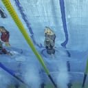 USA's Alex Walsh (L) competes with USA's Leah Hayes (C) and Canada's Mary-Sophie Harvey in the women's 200m medley finals during the Budapest 2022 World Aquatics Championships at Duna Arena in Budapest on June 19, 2022. (Photo by Oli SCARFF / AFP)