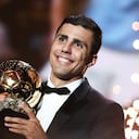 Manchester City's Spanish midfielder Rodri receives the Ballon d'Or award during the 2024 Ballon d'Or France Football award ceremony at the Theatre du Chatelet in Paris on October 28, 2024. (Photo by FRANCK FIFE / AFP)