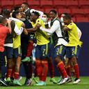 Colombian players celebrate after defeating Uruguay in the penalty shootout of their Conmebol 2021 Copa America football tournament quarter-final match at the Mane Garrincha Stadium in Brasilia, Brazil, on July 3, 2021. (Photo by EVARISTO SA / AFP)