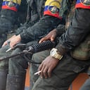 FARC-EP Guerrilla members hold firearms during the announcement by the FARC's Central General Staff (EMC) to open peace talks with the Colombian government during an assembly in San Vicente del Caguan, Colombia on April 16, 2023. (Photo by: Sebastian Marmolejo/Long Visual Press/Universal Images Group via Getty Images)