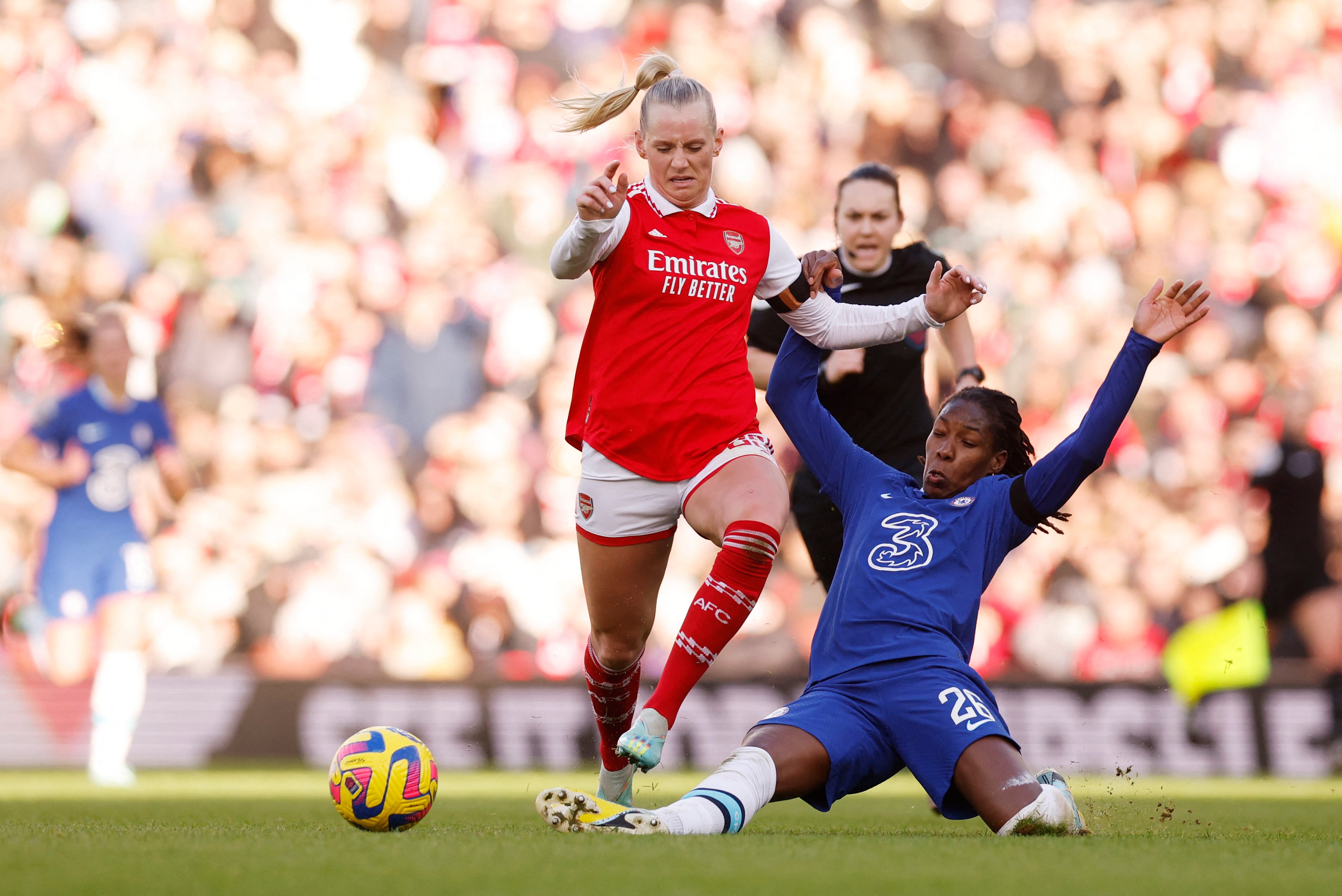 Soccer Football - Women's Super League - Arsenal v Chelsea - Emirates Stadium, London, Britain - January 15, 2023 Arsenal's Stina Blackstenius in action with Chelsea's Kadeisha Buchanan Action Images via Reuters/Andrew Couldridge