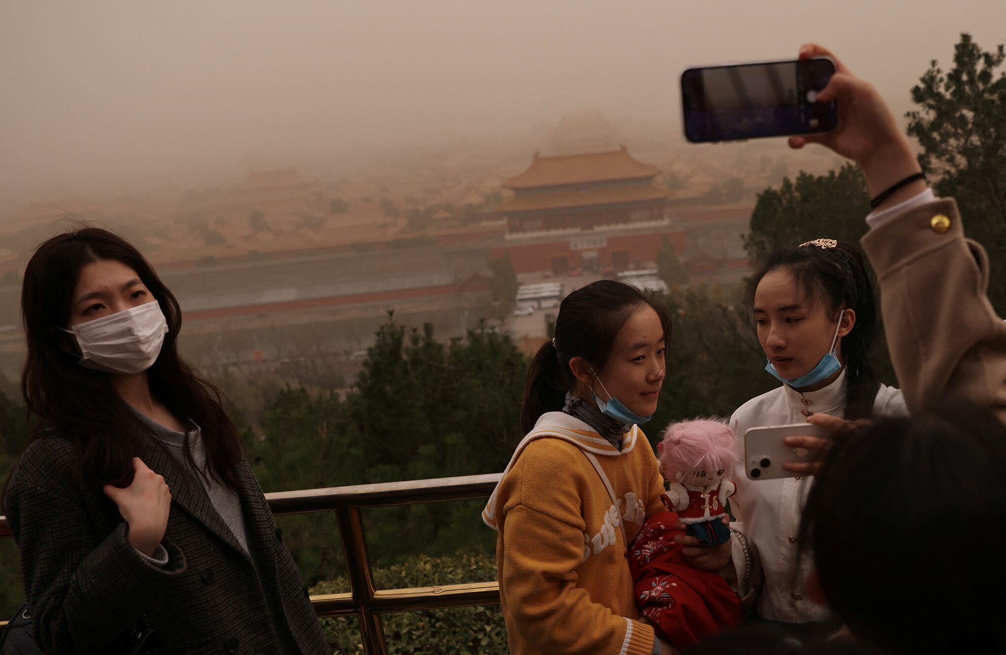 En imágenes : Tormenta de arena y contaminación en los cielos de Beijing