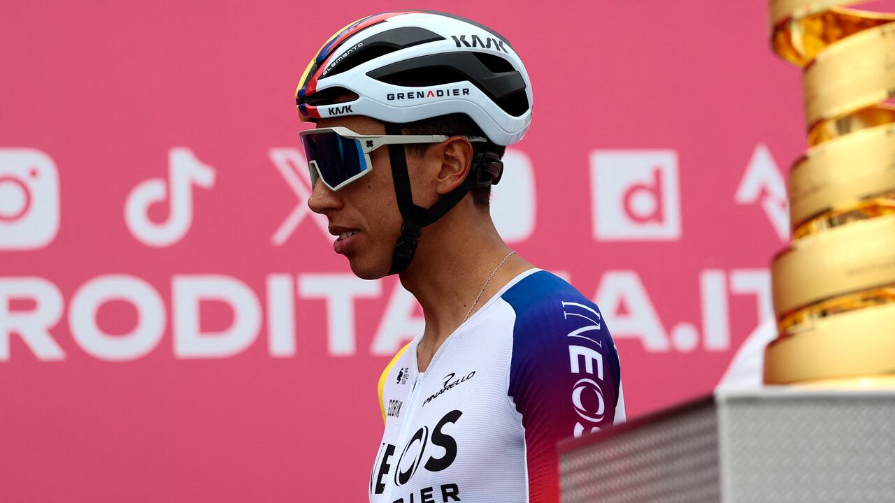 Ineos Grenadiers' Colombian rider Egan Bernal walks past the Giro d'Italia trophy (�trofeo senza fine�) prior to the first stage of the 108th Giro d'Italia cycling race, 160km from Durres to Tirana in Albania, on May 9, 2025. (Photo by Luca Bettini / AFP)