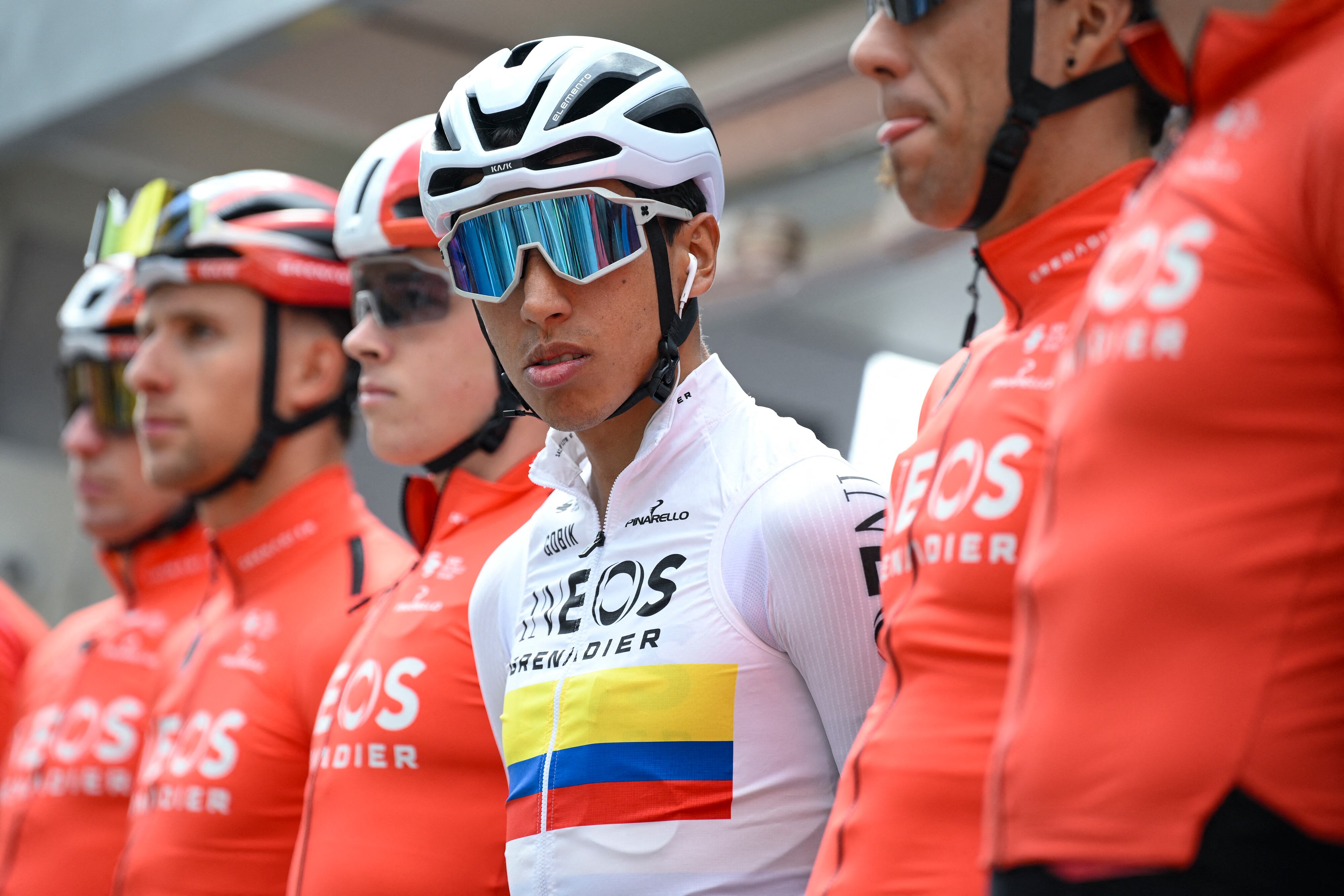 INEOS Grenadiers' Colombian cyclist Egan Bernal (C) stands on the podium prior the start of the first stage of the 2025 Volta a Catalonya cycling tour of Catalonya, a 178,3 km loop starting and finishing in Sant Feliu de Guixols, on March 24, 2025. (Photo by Josep LAGO / AFP)