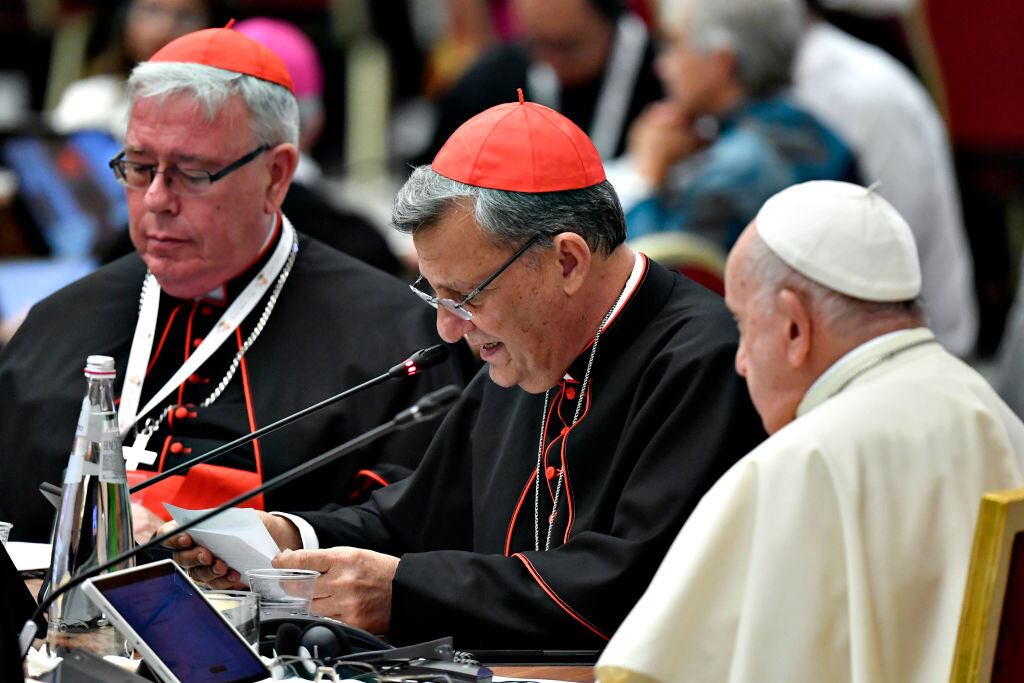 VATICAN CITY, VATICAN - OCTOBER 04:  (EDITOR NOTE: STRICTLY EDITORIAL USE ONLY - NO MERCHANDISING). Pope Francis, flanked by Maltese cardinal Mario Grech and Coptic Catholic Patriarch of Alexandria Ibrahim Isaac Sidrak, attends the Opening of the XVI Ordinary General Assembly of the Synod of Bishops at the Paul VI Hall on October 04, 2023 in Vatican City, Vatican. The Pope gave this powerful reminder during the Opening of the XVI Ordinary General Assembly of the Synod of Bishops, which began today in the Vatican, in his opening remarks. The 16th Ordinary General Assembly of the Synod of Bishops will be held in two moments, that is, in two sessions, spaced one year apart: the first from October 4 to 29, 2023, the second in October 2024. (Photo by Vatican Media viaVatican Pool/Getty Images)