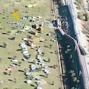 Esta captura de pantalla de un vídeo facilitado por la Guardia Civil muestra una vista aérea de los vagones y los servicios de emergencia en el lugar de la colisión entre dos trenes en Urda, España