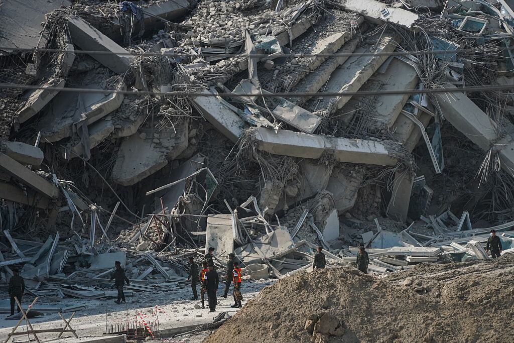 Rescue workers search for survivors of a building collapse after an earthquake in Bangkok, Thailand, on March 28, 2025. A 7.7 magnitude earthquake strikes Myanmar, according to the United States Geological Survey (USGS), with tremors felt in neighboring Thailand. (Photo by Anusak Laowilas/NurPhoto via Getty Images)