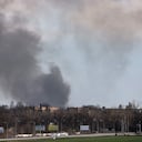 Smoke raises from the airport of Dnipro, on April 10, 2022, amid Russian invasion of Ukraine (Photo by RONALDO SCHEMIDT / AFP)