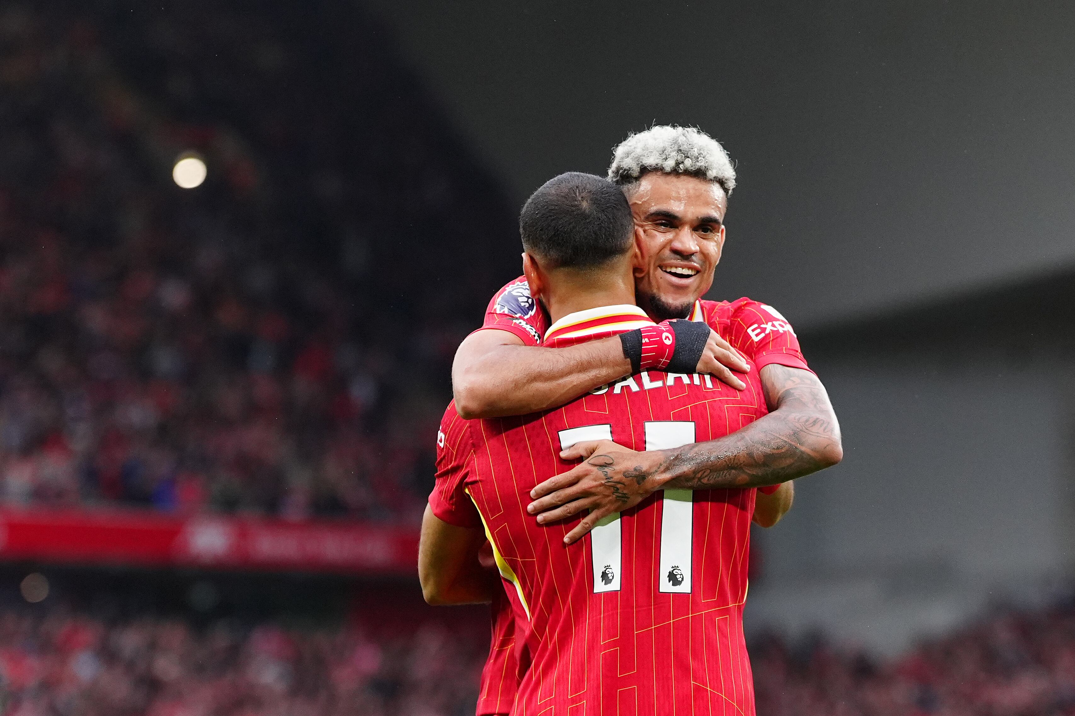 Liverpool's Mohamed Salah celebrates scoring their side's second goal of the game with Luis Diaz (right) during the Premier League match at Anfield, Liverpool. Picture date: Sunday August 25, 2024. (Photo by Peter Byrne/PA Images via Getty Images)