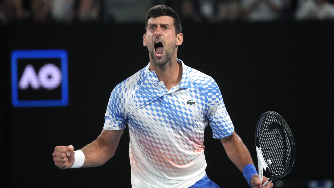 Novak Djokovic of Serbia reacts during his quarterfinal against Andrey Rublev of Russia at the Australian Open tennis championship in Melbourne, Australia, Wednesday, Jan. 25, 2023. (AP/Dita Alangkara)