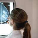 Unrecognizable female gynocologist looking at a patients mammogram at the hospital