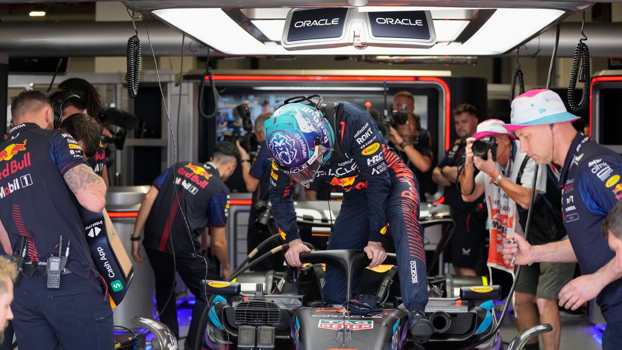 Red Bull driver Max Verstappen of the Netherlands climbs into his car for the start of the third practice session of the Formula One Miami Grand Prix auto race, at Miami International Autodrome in Miami Gardens, Fla., Saturday, May 6, 2023. (AP Photo/Rebecca Blackwell)