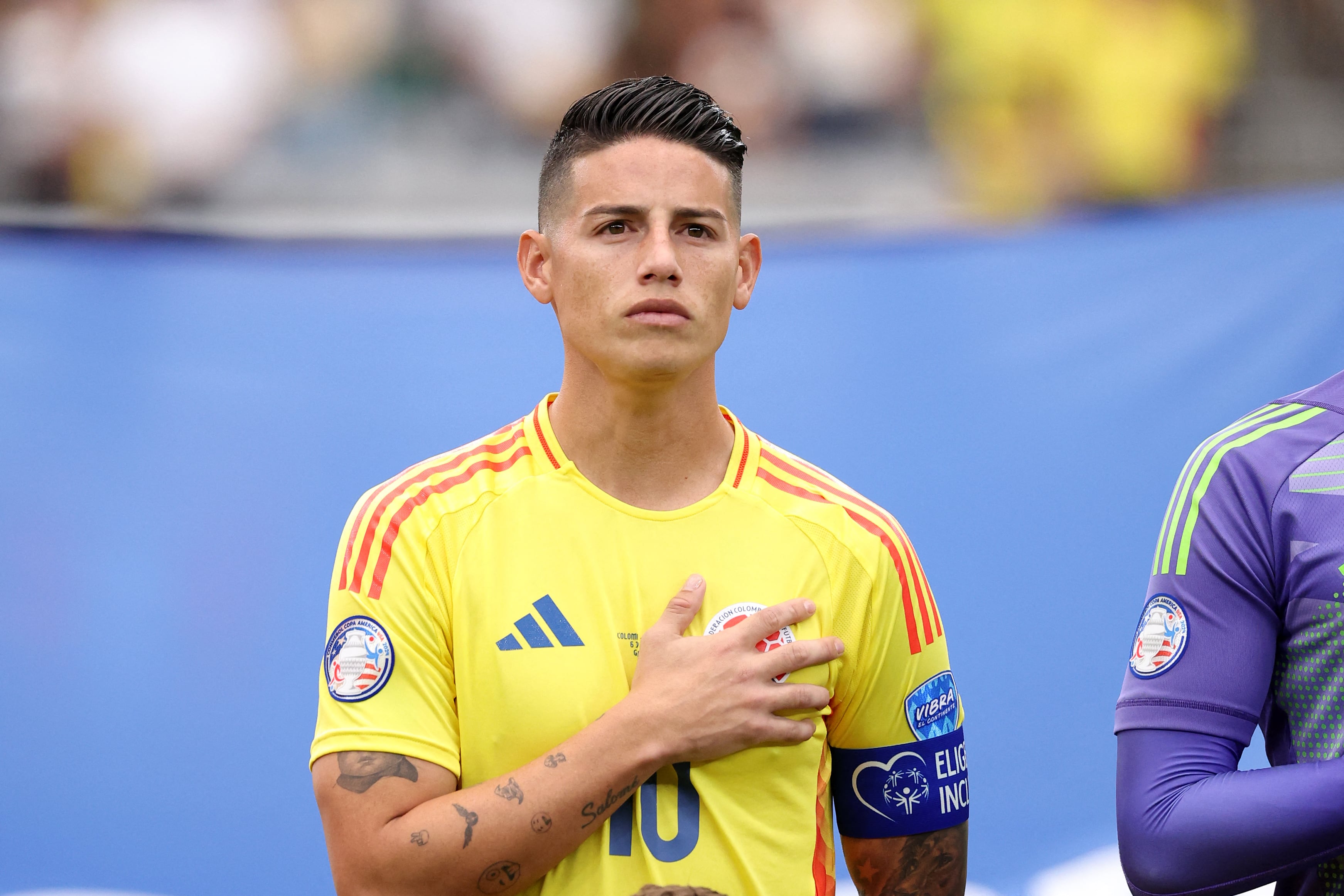 Colombia's midfielder #10 James Rodriguez lines up for the national anthem ahead of the Conmebol 2024 Copa America tournament quarter-final football match between Colombia and Panama at State Farm Stadium in Glendale, Arizona, on July 6, 2024. (Photo by Chris CODUTO / AFP)