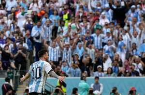 Argentina's Lionel Messi celebrates after scoring his side's opening goal from penalty spot during the World Cup group C soccer match between Argentina and Saudi Arabia at the Lusail Stadium in Lusail, Qatar, Tuesday, Nov. 22, 2022. (AP Photo/Ricardo Mazalan)