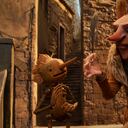 Guillermo del Toro's Pinocchio - (L-R) Pinocchio (voiced by Gregory Mann) and Count Volpe (voiced by Christoph Waltz). Cr: Netflix © 2022