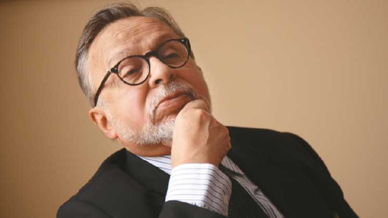 El columnista y caricaturista Héctor Osuna.