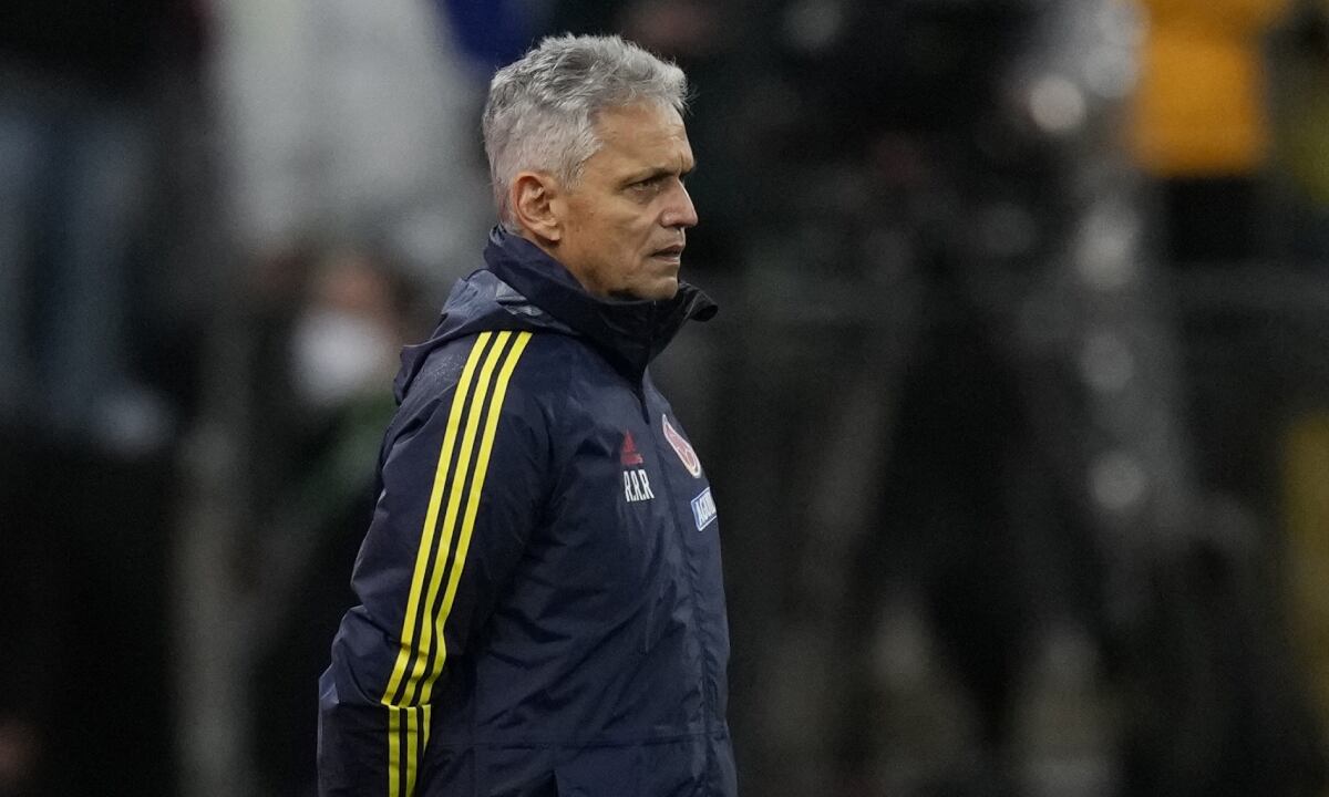 Colombia's coach Reinaldo Rueda watches from the sidelines his team's qualifying soccer match for the FIFA World Cup Qatar 2022 against Brazil at Neo Quimica Arena stadium in Sao Paulo, Brazil, Thursday, Nov.11, 2021. (AP/Andre Penner)