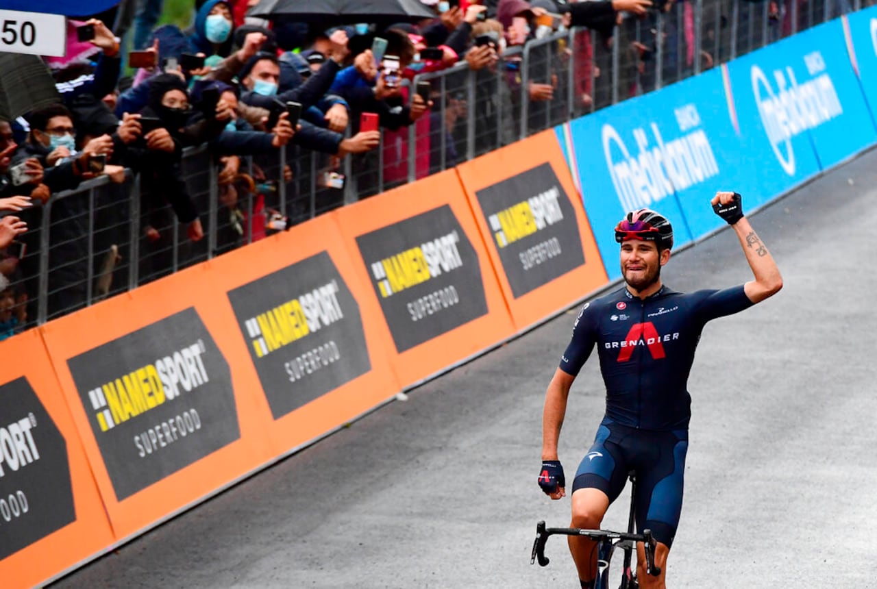 Italy's Filippo Ganna celebrates as he crosses the finish line to win the fifth stage of the Giro D'Italia, tour of Italy cycling race, from Mileto to Camigliatello Silano, Italy, Wednesday, Oct. 7, 2020. (Jennifer Lorenzini/LaPresse via AP)
