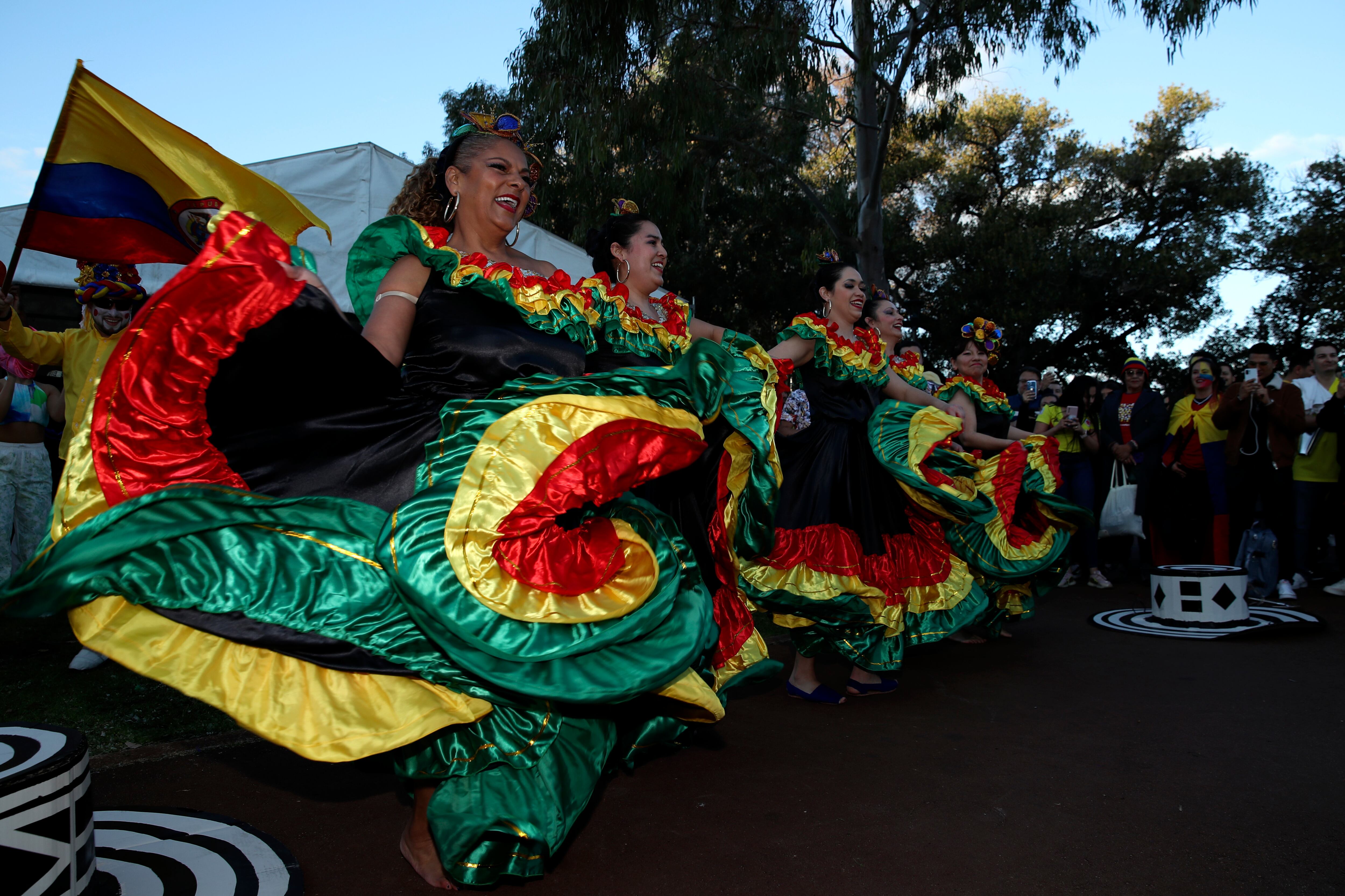 Fans dance and cheer prior the Women's World Cup Group H soccer match between Morocco and Colombia in Perth, Australia, Thursday, Aug. 3, 2023. (AP Photo/Gary Day)