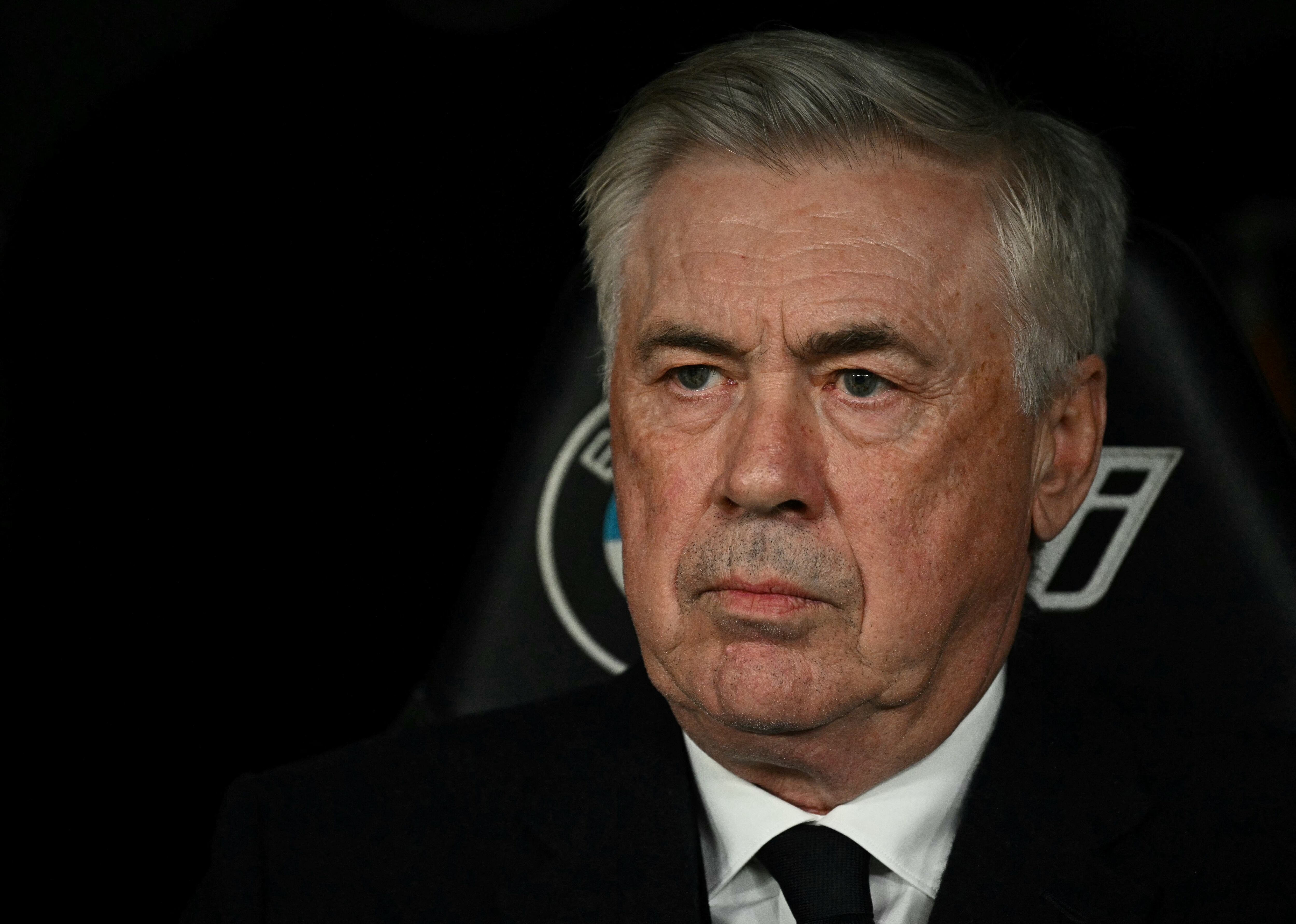 Real Madrid's Italian coach Carlo Ancelotti looks on prior the Spanish league football match between Real Madrid CF and UD Las Palmas at the Santiago Bernabeu stadium in Madrid on January 19, 2025. (Photo by JAVIER SORIANO / AFP)