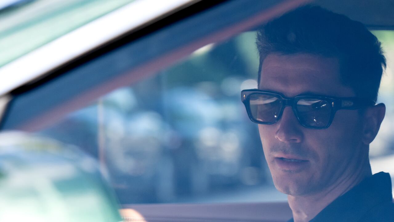 Bayern Munich's Polish forward Robert Lewandowski sits in a car as he leaves the Barmherzige Brueder hospital where he underwent a medical check prior to the start of his club's training session in Munich, southern Germany, on July 12, 2022. (Photo by Sven Hoppe / dpa / AFP) / Germany OUT